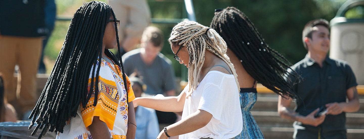 Students dancing in the EMU amphitheater.